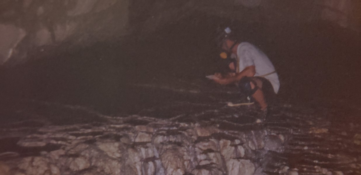 Mike conducting environmental fieldwork in a cave